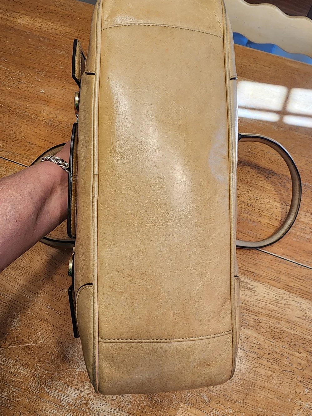 2011 Coach Poppy Push Lock Satchel features a beige leather exterior